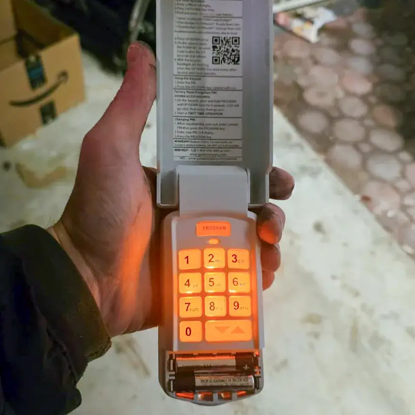 Garage door keypad lock installation and programming in North Jersey home